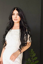 Ukrainian mail order bride Maria from Khmelnitsky with black hair and green eye color - image 9