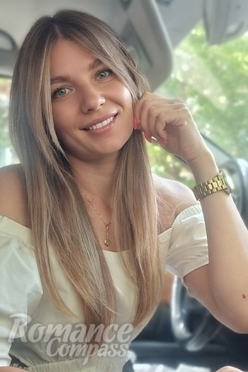 Ukrainian mail order bride Olga from Nikolaev with blonde hair and blue eye color - image 1