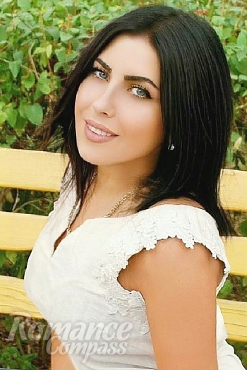 Ukrainian mail order bride Diana from Nikolaev with black hair and blue eye color - image 1