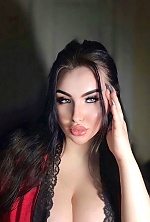 Ukrainian mail order bride Daniela from Rovno with black hair and green eye color - image 10