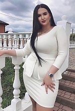 Ukrainian mail order bride Daniela from Rovno with black hair and green eye color - image 9
