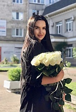 Ukrainian mail order bride Daniela from Rovno with black hair and green eye color - image 8