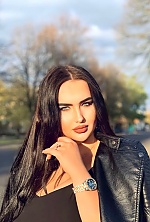 Ukrainian mail order bride Daniela from Rovno with black hair and green eye color - image 4