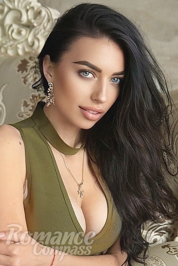 Ukrainian mail order bride Alena from Chuguev with black hair and blue eye color - image 1