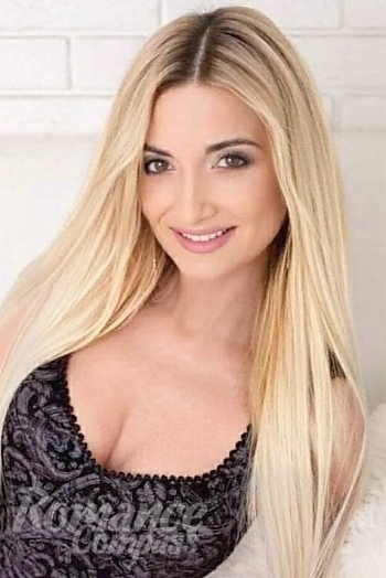 Ukrainian mail order bride Galya from Kiev with blonde hair and grey eye color - image 1