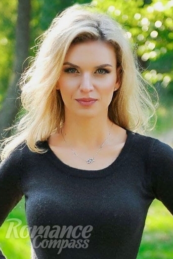 Ukrainian mail order bride Alevtyna from Odessa with light brown hair and blue eye color - image 1