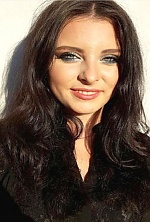 Ukrainian mail order bride Lubov from Petropavlovka with black hair and green eye color - image 7