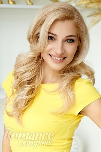 Ukrainian mail order bride Olga from Odessa with blonde hair and green eye color - image 1