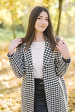 Ukrainian mail order bride Karina from Kamenets Podolsk with black hair and green eye color - image 8