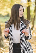 Ukrainian mail order bride Karina from Kamenets Podolsk with black hair and green eye color - image 9