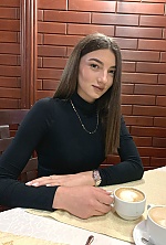 Ukrainian mail order bride Karina from Kamenets Podolsk with black hair and green eye color - image 2