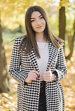 Ukrainian mail order bride Karina from Kamenets Podolsk with black hair and green eye color - image 7