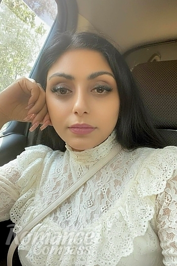 Ukrainian mail order bride Angelika from Lugansk with black hair and black eye color - image 1