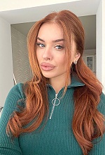 Ukrainian mail order bride Ruslana from Odessa with red hair and green eye color - image 3