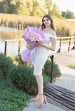 Ukrainian mail order bride Karina from Starokonstantinov with light brown hair and blue eye color - image 2