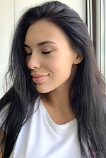 Ukrainian mail order bride Adelia from Kazan with black hair and green eye color - image 18