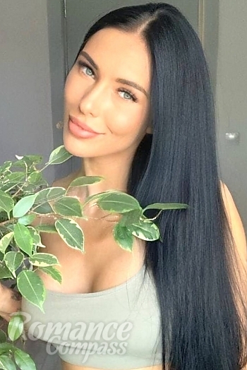 Ukrainian mail order bride Adelia from Kazan with black hair and green eye color - image 1