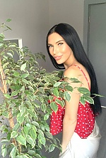 Ukrainian mail order bride Adelia from Kazan with black hair and green eye color - image 12