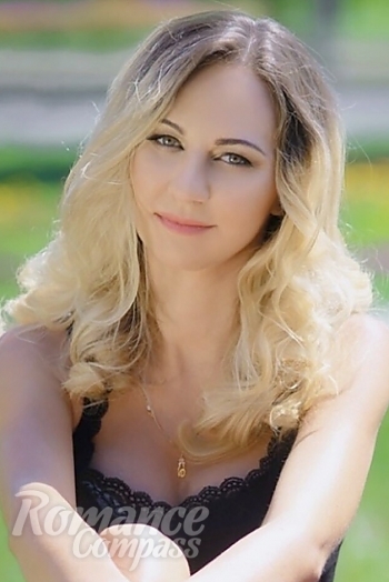 Ukrainian mail order bride Elena from Sumy with blonde hair and grey eye color - image 1