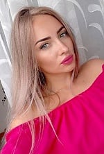 Ukrainian mail order bride Krystsina from Minsk with blonde hair and blue eye color - image 3