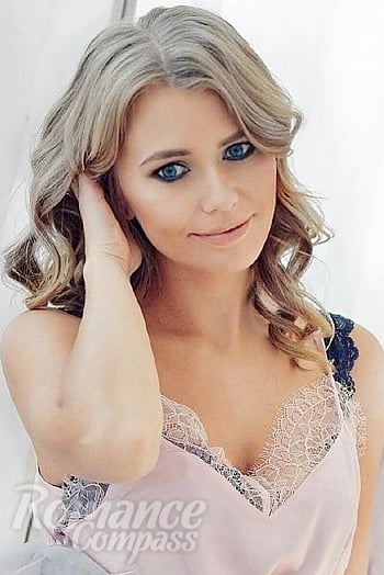 Ukrainian mail order bride Daria from Moscow with blonde hair and blue eye color - image 1