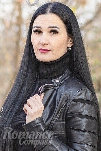 Ukrainian mail order bride Victoria from Kharkov with black hair and black eye color - image 1