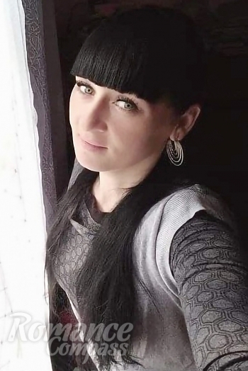 Ukrainian mail order bride Olga from Kherson with black hair and brown eye color - image 1