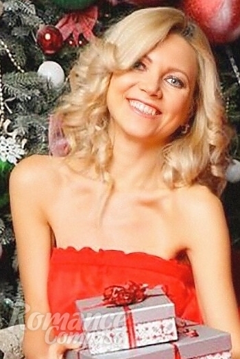 Ukrainian mail order bride Liudmila from Odessa with blonde hair and blue eye color - image 1