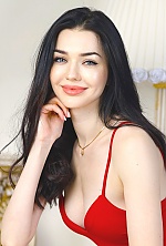Ukrainian mail order bride Yuliia from Kiev with black hair and green eye color - image 4