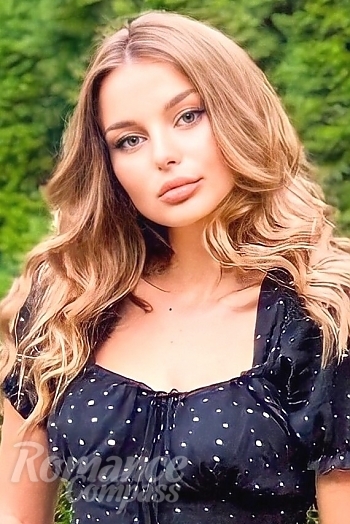 Ukrainian mail order bride Diana from Chernivtsi with light brown hair and blue eye color - image 1