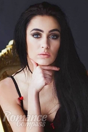 Ukrainian mail order bride Anna from Kiev with black hair and grey eye color - image 1