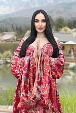 Ukrainian mail order bride Ekaterina from Odessa with black hair and green eye color - image 12