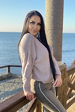 Ukrainian mail order bride Ekaterina from Odessa with black hair and green eye color - image 16