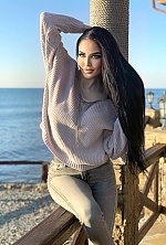 Ukrainian mail order bride Ekaterina from Odessa with black hair and green eye color - image 17