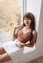Ukrainian mail order bride Adelina from Zaporozhye with light brown hair and blue eye color - image 8