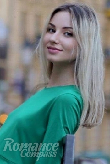 Ukrainian mail order bride Karyna from Chernihiv with light brown hair and green eye color - image 1