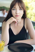 Ukrainian mail order bride Anastasia from Kiev with light brown hair and blue eye color - image 9