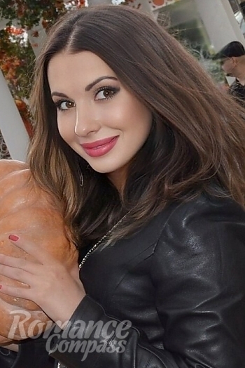 Ukrainian mail order bride Natalia from Kyiv with light brown hair and black eye color - image 1