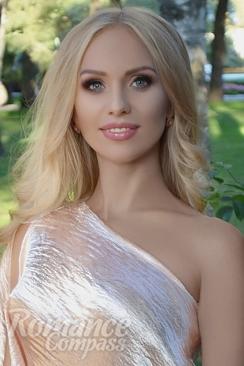 Ukrainian mail order bride Tatyana from Kharkov with blonde hair and blue eye color - image 1