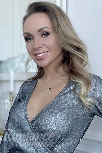 Ukrainian mail order bride Uliana from Kiev with blonde hair and blue eye color - image 1