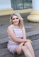 Ukrainian mail order bride Oksana from London with blonde hair and grey eye color - image 16
