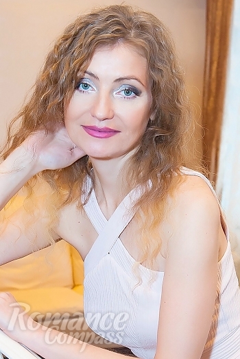 Ukrainian mail order bride Oksana from Odessa with blonde hair and green eye color - image 1