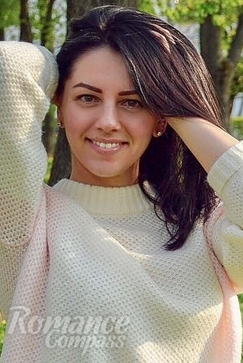 Ukrainian mail order bride Vitalina from Poltava with black hair and hazel eye color - image 1