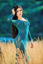 Ukrainian mail order bride Nadiia from Zaporozhye with black hair and green eye color - image 9