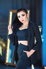 Ukrainian mail order bride Nadiia from Zaporozhye with black hair and green eye color - image 11