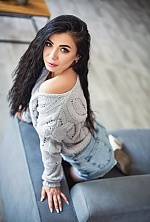 Ukrainian mail order bride Nadiia from Zaporozhye with black hair and green eye color - image 8
