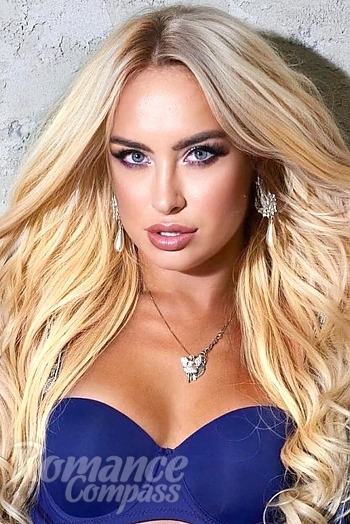 Ukrainian mail order bride Elena from Kiev with blonde hair and blue eye color - image 1