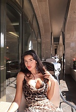 Ukrainian mail order bride Karina from Dnipro with black hair and green eye color - image 13