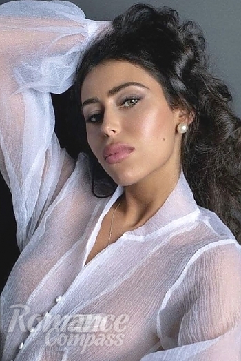 Ukrainian mail order bride Karina from Dnipro with black hair and green eye color - image 1