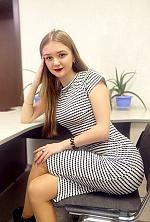 Ukrainian mail order bride Yuliia from Zaporozhye with light brown hair and blue eye color - image 9